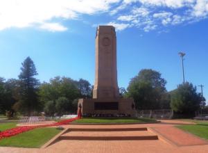 Wreaths at Dubbo War Memorial after 2015 Anzac Day dawn service in area where the flag from the 1915 Coo-ee March would have been draped in 1925 (Photograph: H. Thompson 24/5/2015)