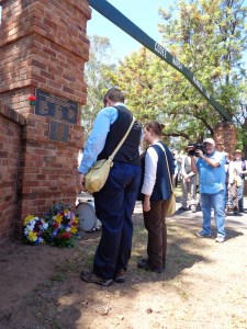 William Hitchen and Joanne Holmes laying a wreath